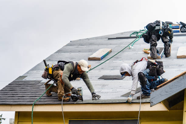 Professional Roofing technician working in Santa Clarita, CA